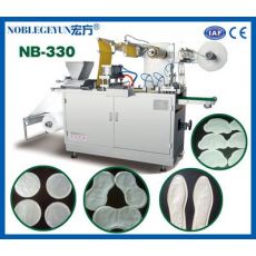 NB-330型暖寶寶包裝機(jī)，全自動(dòng)發(fā)熱貼生產(chǎn)設(shè)備